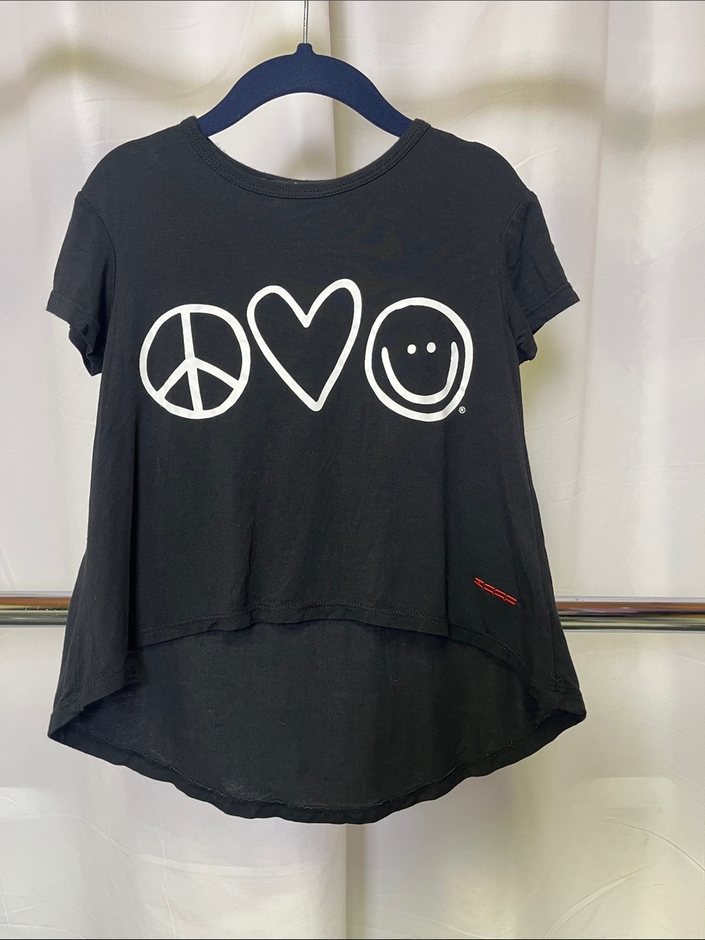 Peace Love World girls Black hi-low Tee with White Peace Heart Smile Graphics 4